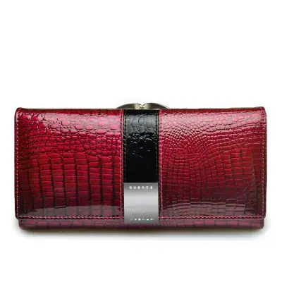 Elegant red and black crocodile leather wallet for women with premium craftsmanship and stylish design. Perfect accessory for fashion-conscious individuals seeking luxury and functionality.