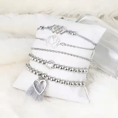Vintage-inspired silver bracelets and anklet, perfect for fashion and gifting, featuring heart, lotus, and geometric designs. Stylish accessories for various occasions.