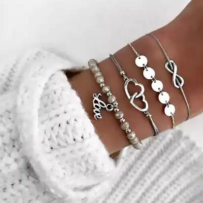 Stylish silver bracelets with heart, infinity, and