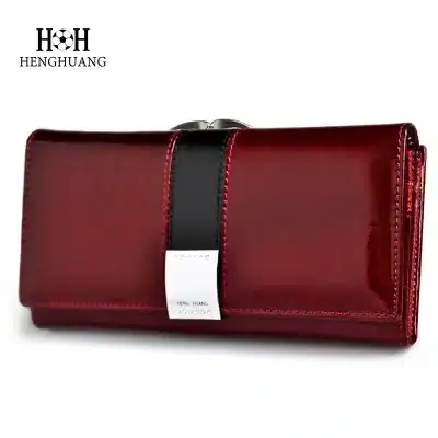 Luxurious red leather wallet featuring a sleek design, durable construction, and functional compartments, ideal for women seeking stylish accessories or a thoughtful gift for special occasions.