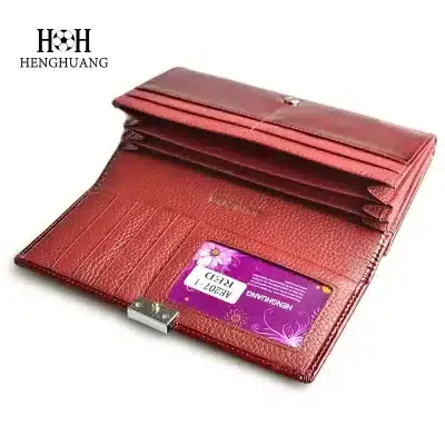 Red leather wallet featuring multiple card slots and compartments, perfect for organizing essential cards and cash, ideal for women and men seeking a fashionable, functional wallet.