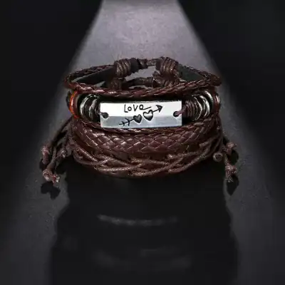 Bracelet with leather and metal elements, engraved