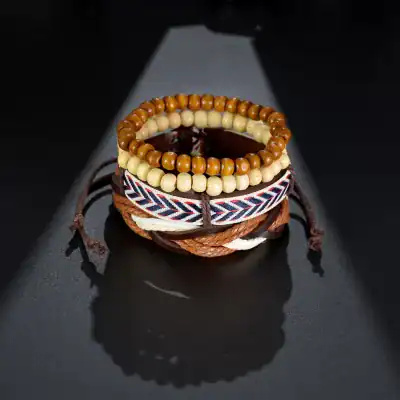 Colorful beaded and fabric bracelets perfect for casual or boho fashion styles. Adjustable or elastic designs with natural wood beads, embroidered, and leather accents.