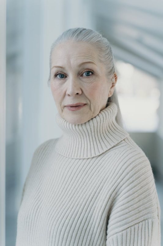 An Elderly Woman in Turtleneck Sweater