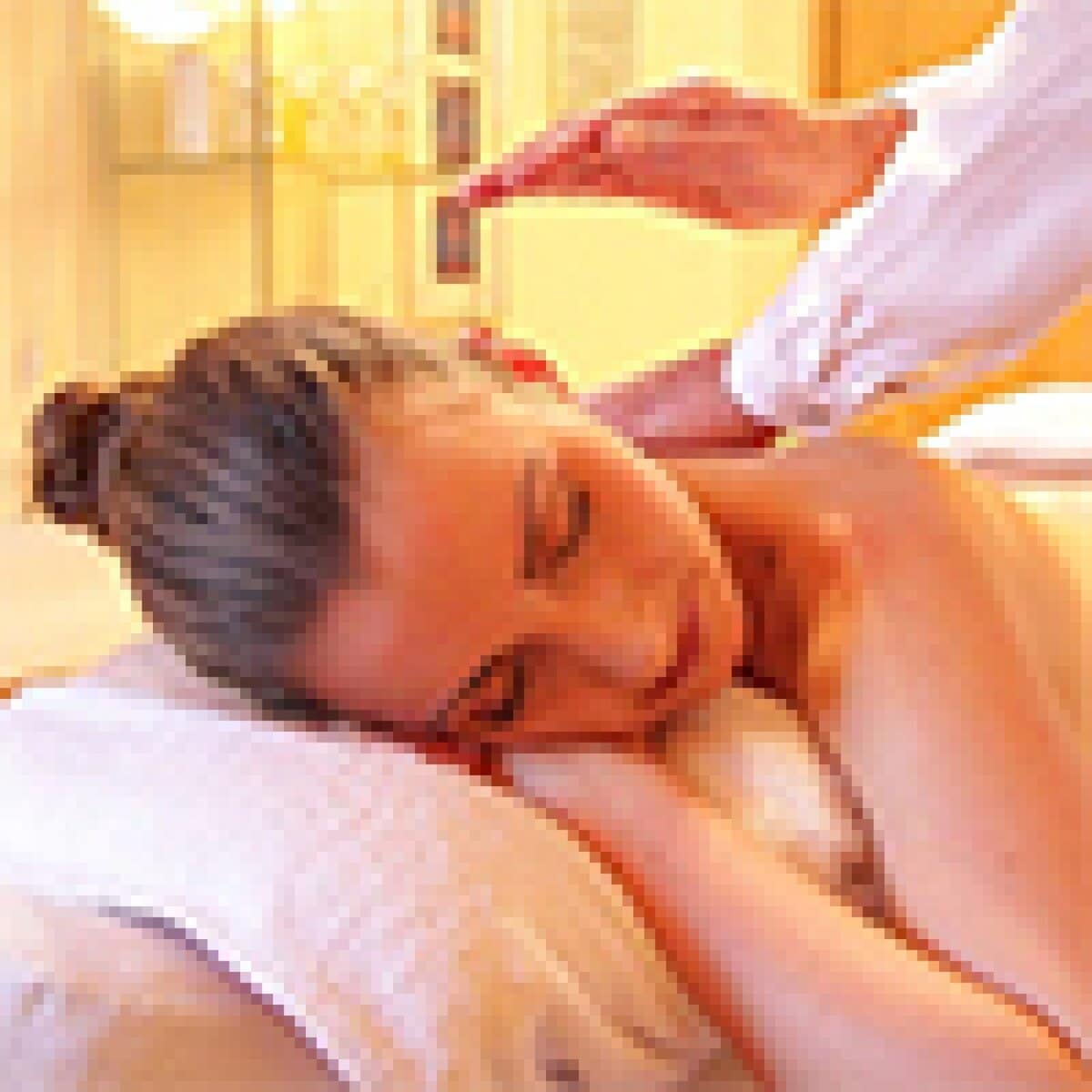 Relaxing massage at Monalisa Store for wellness and skincare, offering professional treatments in a calming environment to promote relaxation and beauty enhancement.