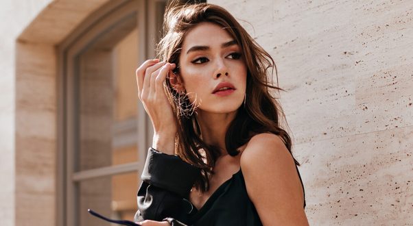 Stylish woman with elegant jewelry showcasing optical accessories at Monalisa Medical Store. Perfect for fashionable eyewear shopping and vision care.