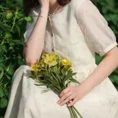 A stylish beige dress with delicate leaf embroidery, perfect for fashion-conscious women seeking high-quality eyewear at Monalisa Store.