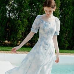 Stylish light blue and white watercolor dress with puff sleeves, perfect for elegant occasions and summer outings. Available at Monalisa Store for fashionable women.