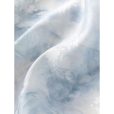 Luxurious satin fabric featuring a delicate floral pattern, perfect for high-end fashion and home decor. Shop elegant textiles at Monalisa Store, your destination for quality fabrics and stylish designs.