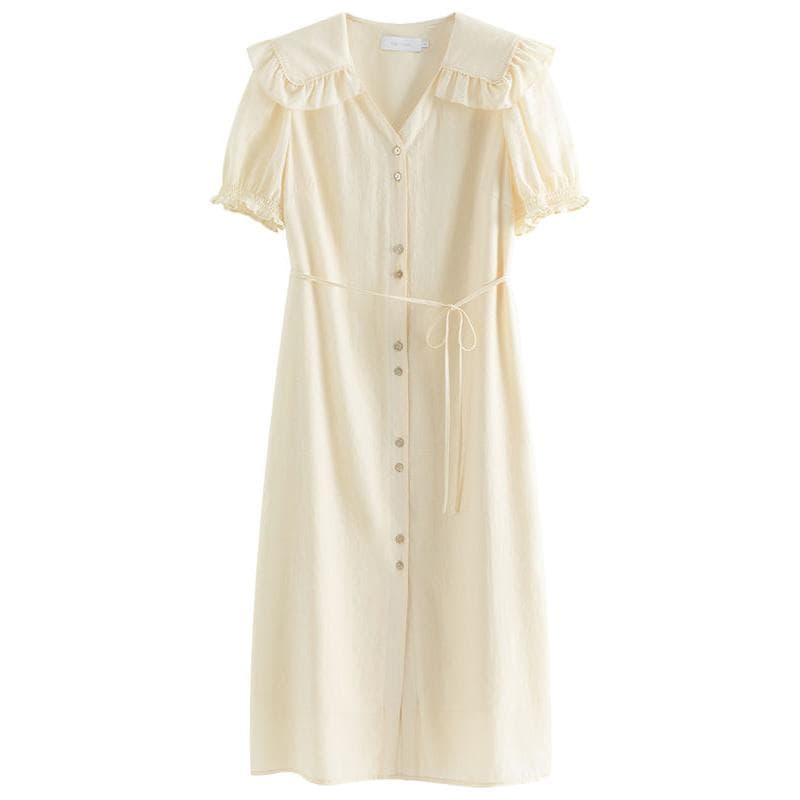 Cream dress with button-down front, short puff sleeves, ruffled collar, and waist tie, perfect for stylish outings and casual wear.