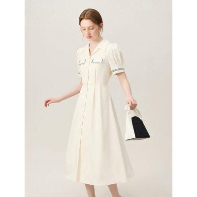 Stylish women's white dress featuring a vintage-inspired design with puff sleeves, a collar, and decorative stitching, perfect for casual or semi-formal occasions.