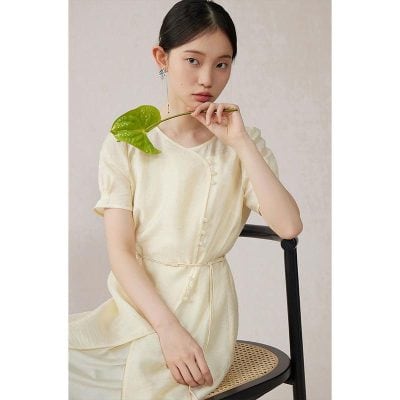 Stylish cream satin dress for women, perfect for casual and formal occasions, with comfortable fit and elegant design.