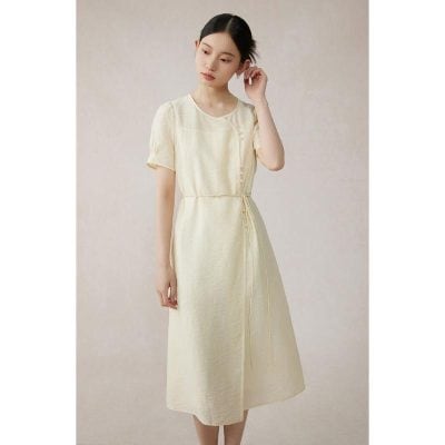 Stylish beige modest midi dress with short sleeves, ideal for women seeking comfortable and fashionable options for special occasions or everyday wear.