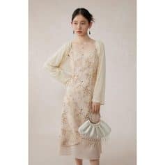 Stylish floral dress paired with a light cardigan, perfect for women seeking trendy and comfortable outfits. Shop now at Monalisa Store for fashionable women's clothing and accessories.