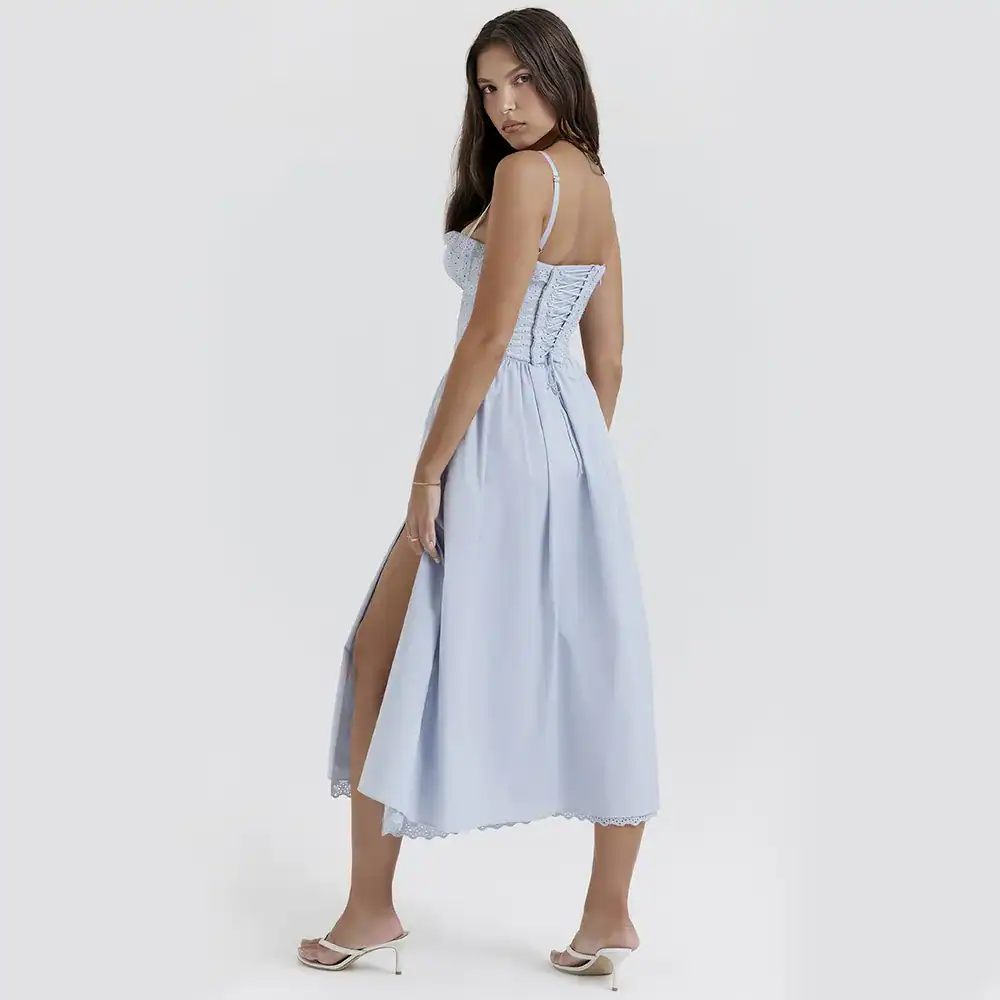 Beautiful blue maxi dress featuring a side slit and lace-up detailing on the back, perfect for summer or special occasions. Made with high-quality, breathable fabric for comfort and style.