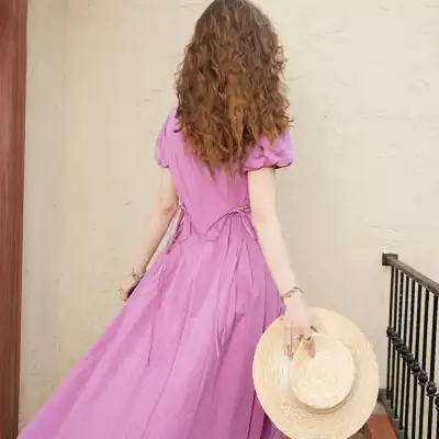 Stylish pink maxi dress perfect for summer and casual outings, featuring lightweight fabric and flowy design for comfort and elegance.