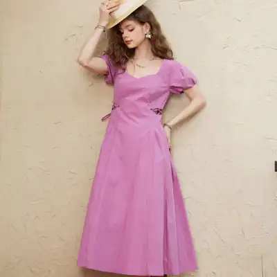 Stylish pink dress with puff sleeves and flowy design, perfect for summer and casual occasions. Discover fashion-forward women's clothing at Monalisa Store.