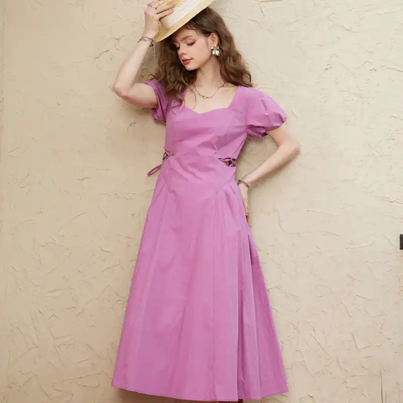 Stylish pink dress with puff sleeves and flowy design, perfect for summer and casual occasions. Discover fashion-forward women's clothing at Monalisa Store.