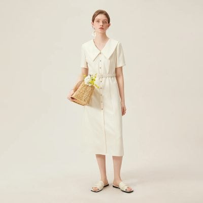 Elegant cream-colored dress with button details and a large collar, perfect for casual or semi-formal occasions, available at Monalisa Medical store.