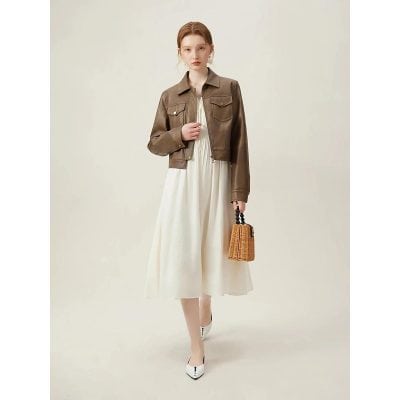 Stylish brown leather jacket for women, perfect for casual and formal wear, adds elegance to your look. Perfect for fall or spring fashion statements.