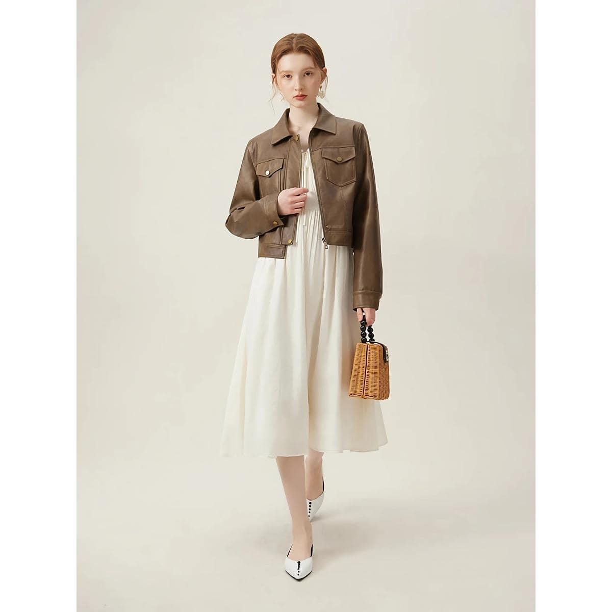 Stylish brown leather jacket for women, perfect for casual and formal wear, adds elegance to your look. Perfect for fall or spring fashion statements.