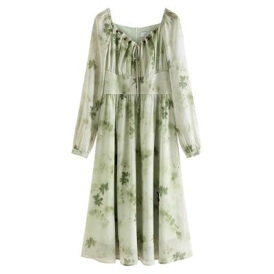 Light green flowy dress featuring a floral pattern, long sleeves, and a tie neckline perfect for warm weather.