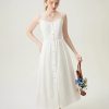 Elegant white summer dress with spaghetti straps and button-down front, perfect for fashion-forward women seeking stylish, comfortable, and versatile clothing from Monalisa Store.
