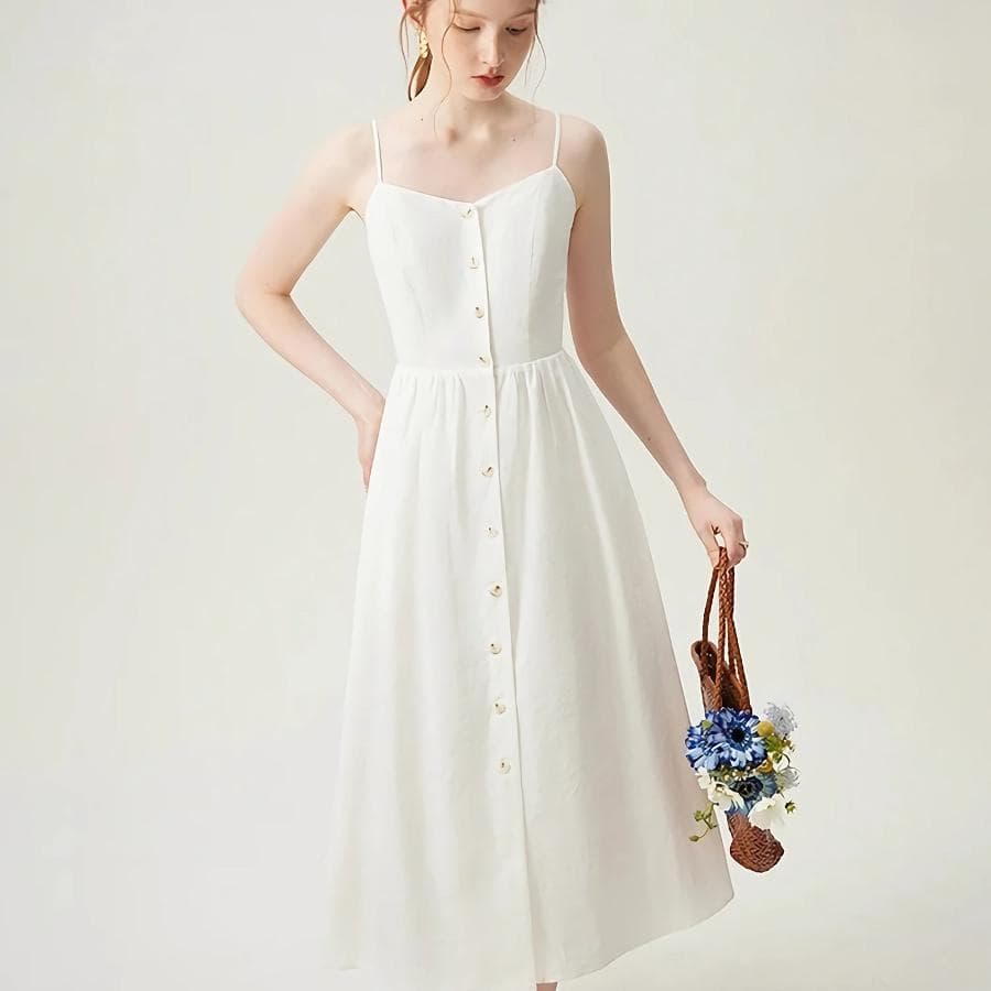Elegant white summer dress with spaghetti straps and button-down front, perfect for fashion-forward women seeking stylish, comfortable, and versatile clothing from Monalisa Store.