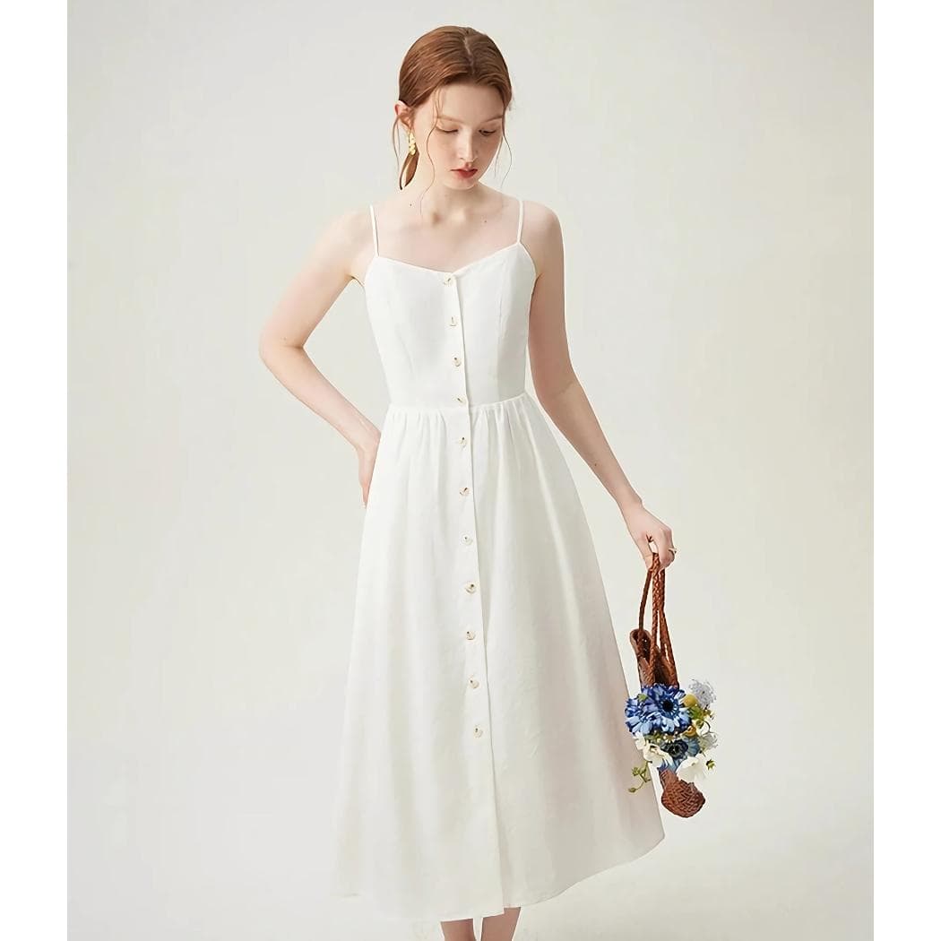 Chic and comfortable white dress with button details, ideal for summer outings or casual events. Shop now at Monalisa Medical Store for trendy women's fashion essentials.