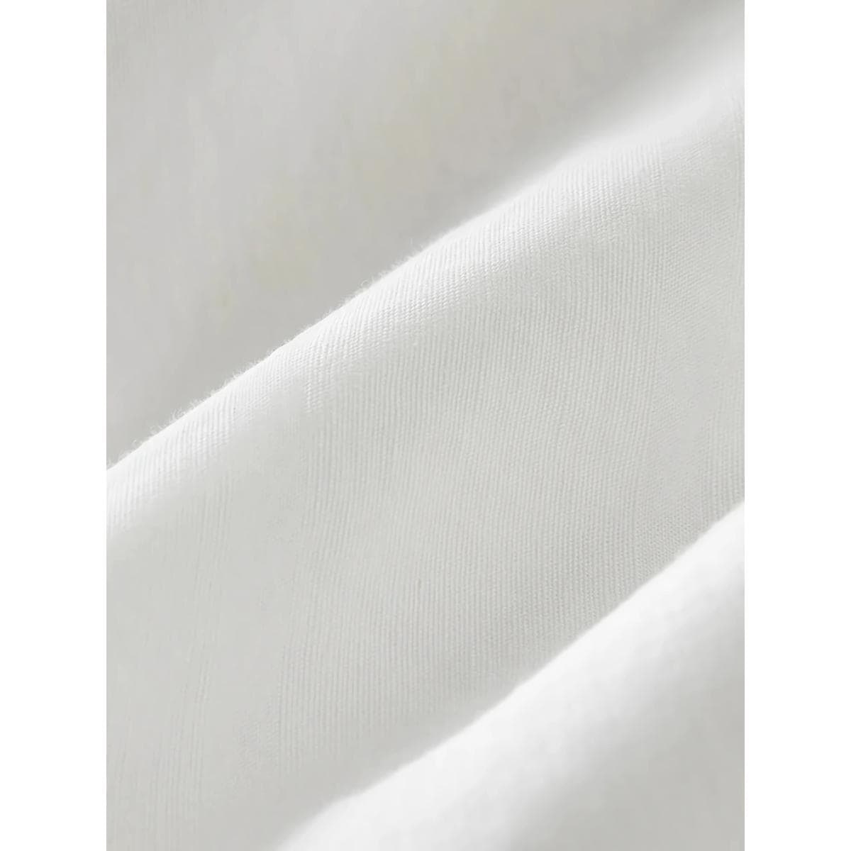 Close-up of smooth, high-quality silk white fabric perfect for optometry exam tables or medical use. Soft, durable, and seamless, ideal for comfortable and hygienic patient care environments.