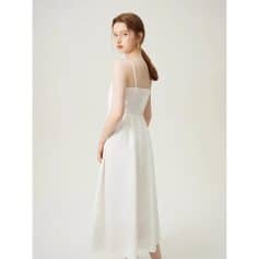 Simple and stylish white dress with spaghetti straps, perfect for summer or special occasions, available at Monalisa Store for fashionable women's clothing.