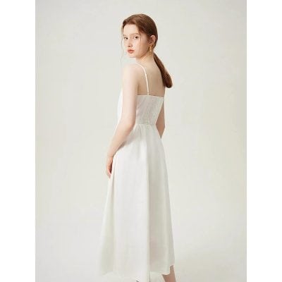 Simple and stylish white dress with spaghetti straps, perfect for summer or special occasions, available at Monalisa Store for fashionable women's clothing.