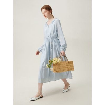 Stylish women’s long light blue dress with flowy sleeves, V-neck, and adjustable drawstring waist, perfect for casual or semi-formal occasions.