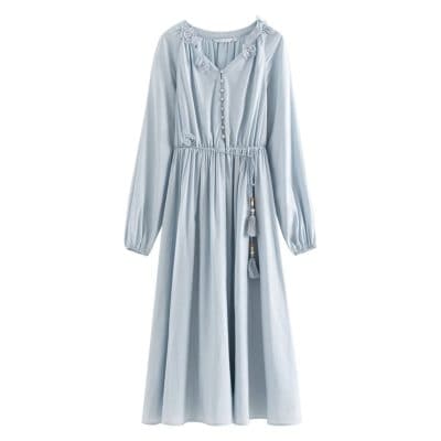 A stylish pastel blue women's dress with floral embroidery, button front, long sleeves, elastic waist, and tassel embellishments, ideal for everyday wear and special events.