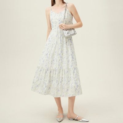 Chic floral maxi dress with lightweight fabric, spaghetti straps, and a flowy hemline. Perfect for summer fashion, casual outings, or garden parties, this dress combines comfort with elegance for women.