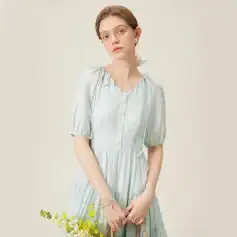 Beautiful women's dress with a soft, silky texture and delicate detailing, perfect for casual or semi-formal occasions, showcasing timeless elegance and modern comfort.