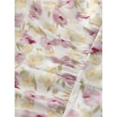 Soft floral sleepwear fabric with pastel pink and cream watercolor pattern, perfect for comfortable, stylish bedwear.