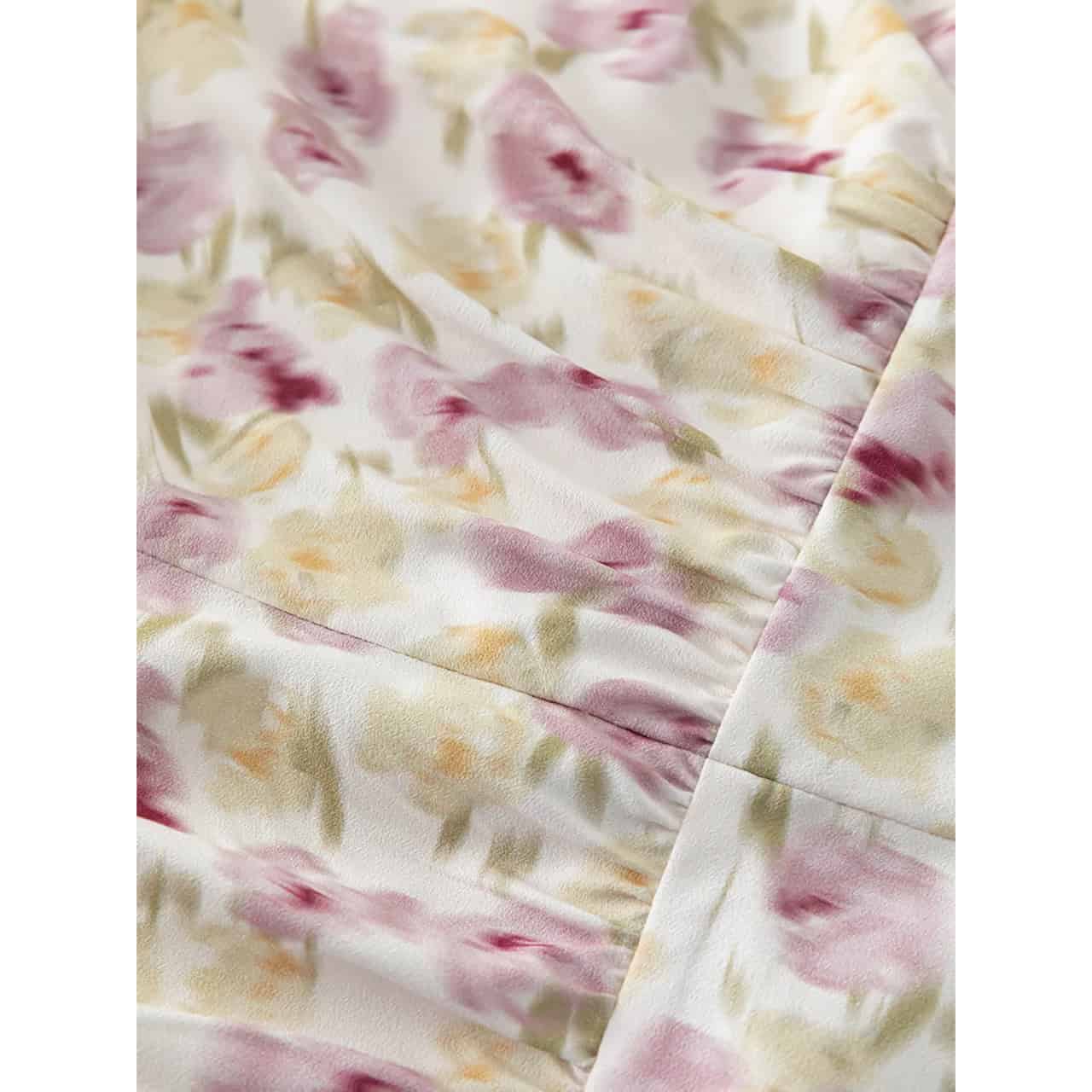 Soft floral sleepwear fabric with pastel pink and cream watercolor pattern, perfect for comfortable, stylish bedwear.