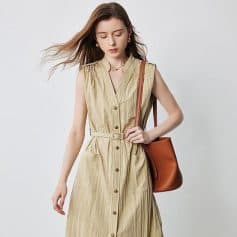Elegant linen dress with button-down front, sleeveless design, and waist belt, perfect for casual and summer wear, available at Monalisa Store.