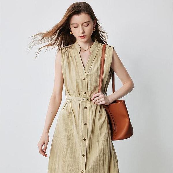 Elegant linen dress with button-down front, sleeveless design, and waist belt, perfect for casual and summer wear, available at Monalisa Store.