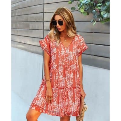 Stylish coral and white floral summer dress perfect for casual outings, beachwear, or outdoor events. Comfortable, trendy, and lightweight fabric ideal for warm weather.