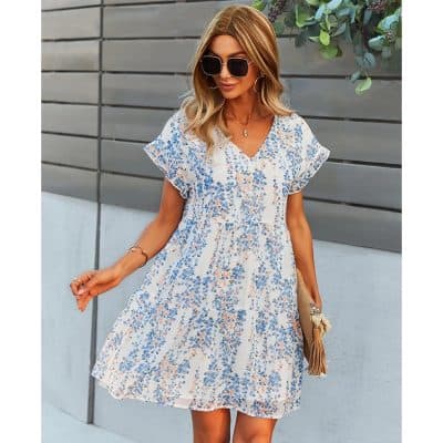 Stylish floral summer dress with a flattering fit, perfect for warm-weather outfits. Features a V-neckline and breezy short sleeves, ideal for women seeking casual yet chic fashion.