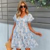Stylish women's floral summer dress with a comfortable fit, perfect for casual outings or vacations. Features a V-neckline, ruffle sleeves, and a flowy silhouette to enhance your look.