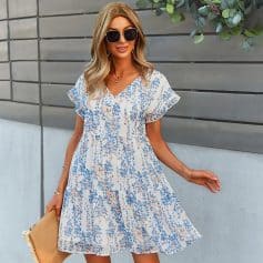 Stylish women's floral summer dress with a comfortable fit, perfect for casual outings or vacations. Features a V-neckline, ruffle sleeves, and a flowy silhouette to enhance your look.