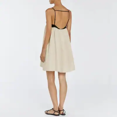 Stylish dress with adjustable straps, flowy beige skirt, perfect for summer or casual wear. Affordable fashion options at Monalisa Store.