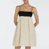 Elegant black and beige summer dress with spaghetti straps, perfect for casual outings or warm weather. Comfortable, stylish, and versatile attire for women.