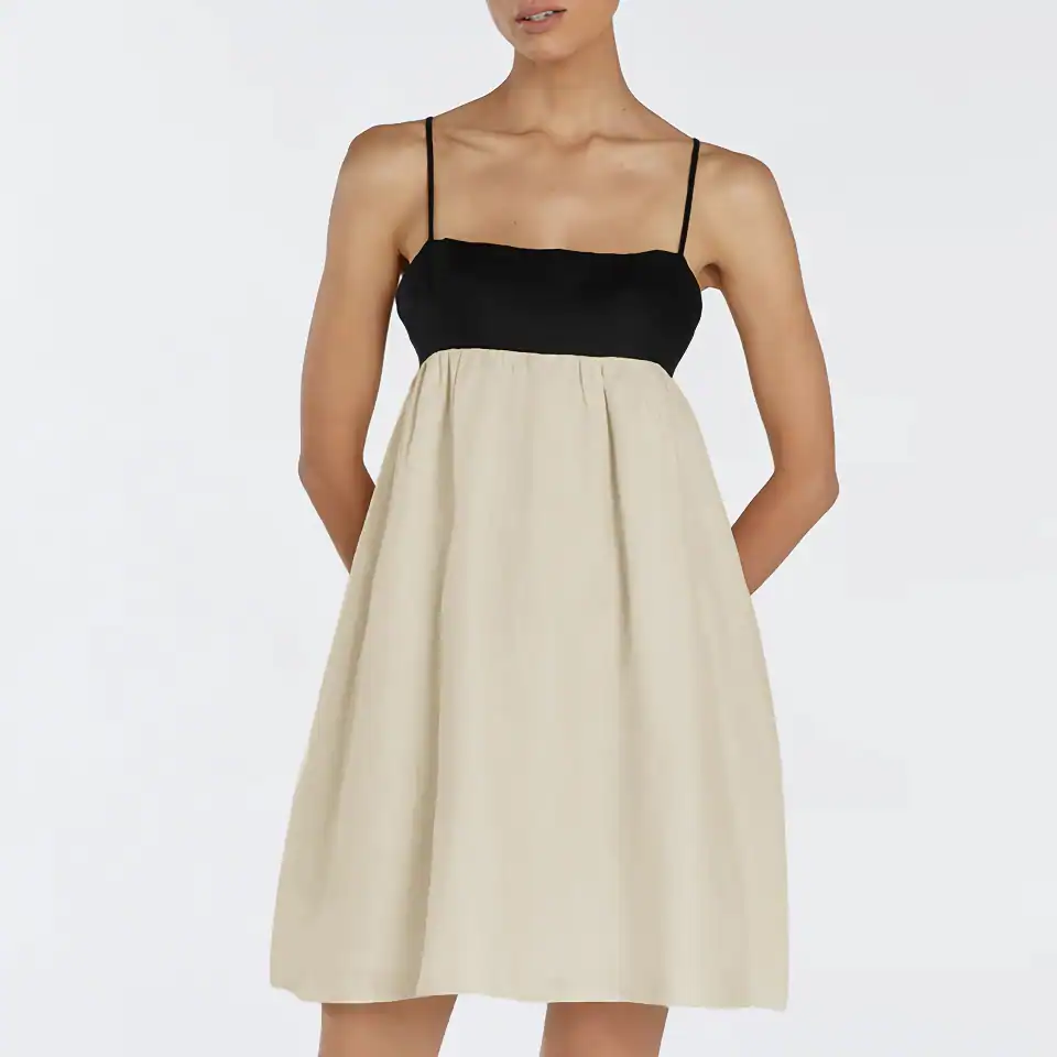 Elegant black and beige summer dress with spaghetti straps, perfect for casual outings or warm weather. Comfortable, stylish, and versatile attire for women.