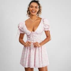 High-quality women's dress with floral pattern, puff sleeves, and tie-front design perfect for casual or semi-formal occasions.