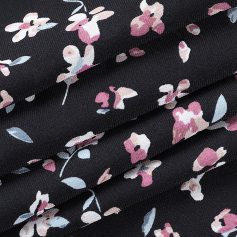 Close-up of black floral mesh fabric featuring pink and white flower patterns, ideal for fashion, clothing, and accessories. Perfect for elegant, trendy designs.