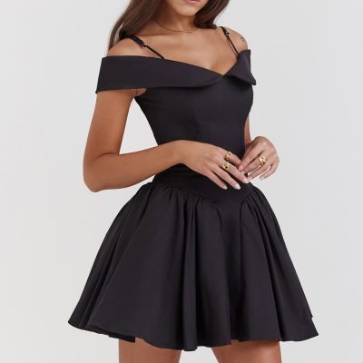 Elegant black off-shoulder dress with adjustable straps, perfect for formal or casual occasions. Made from high-quality fabric, flattering fit, and stylish design for women.